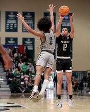 Zevi Samet takes a shot on his way to scoring a game-high 37 points